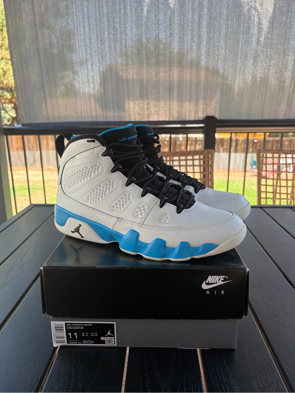 Men’s Jordan 9 powder blue with box.